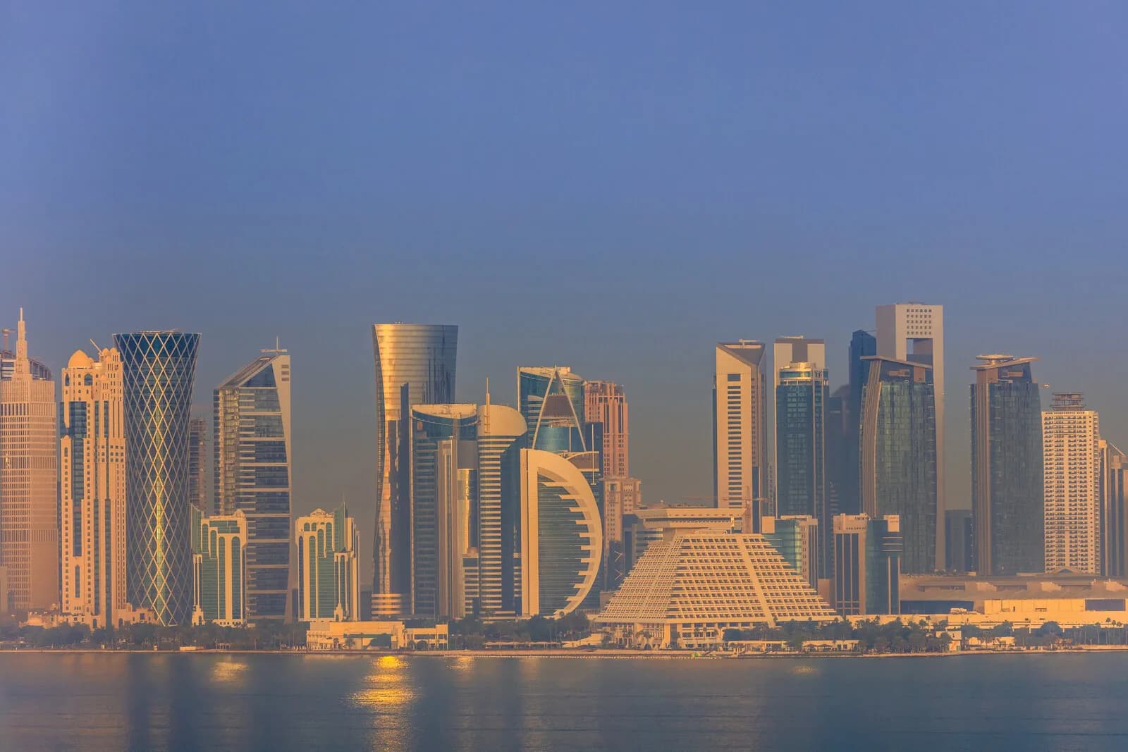 Doha skyline and recruitment market in Qatar