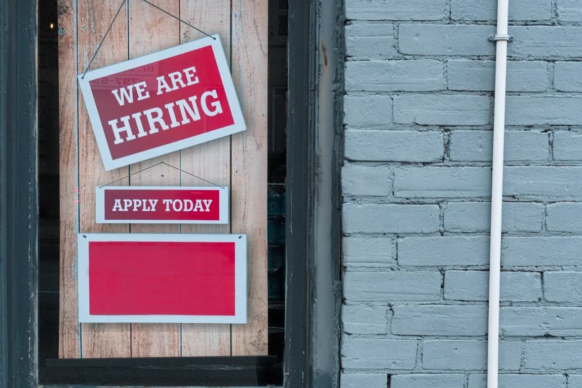We are hiring sign displayed at a workplace