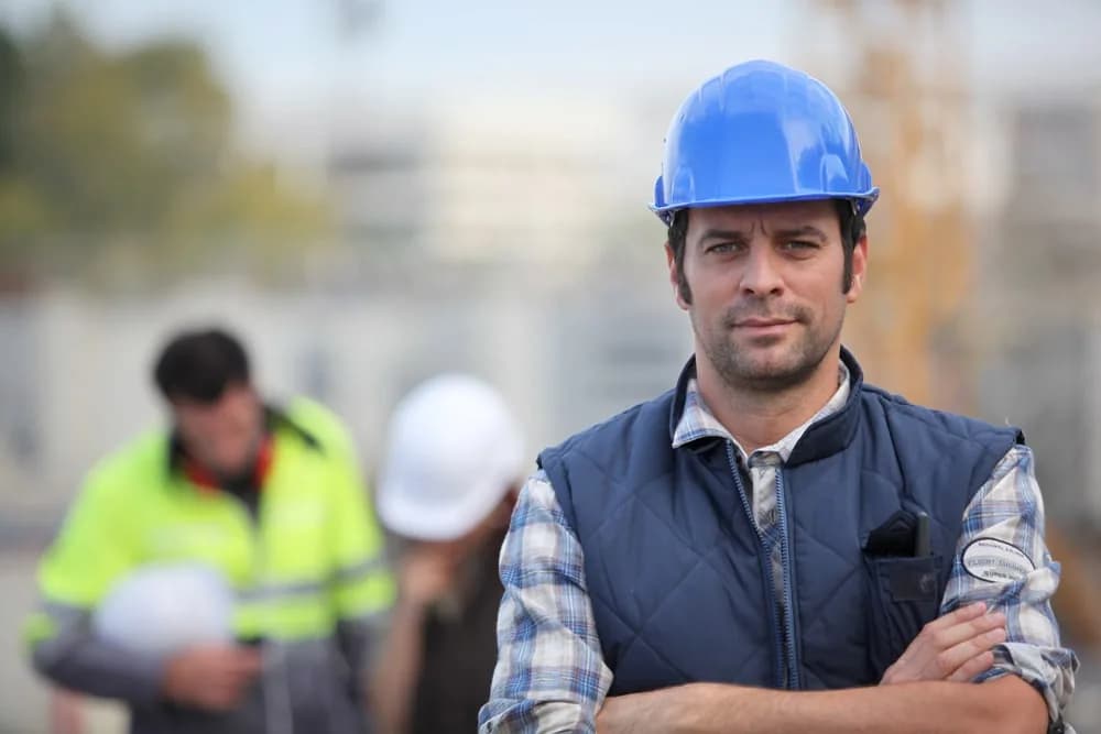 Construction supervisor working with a project team