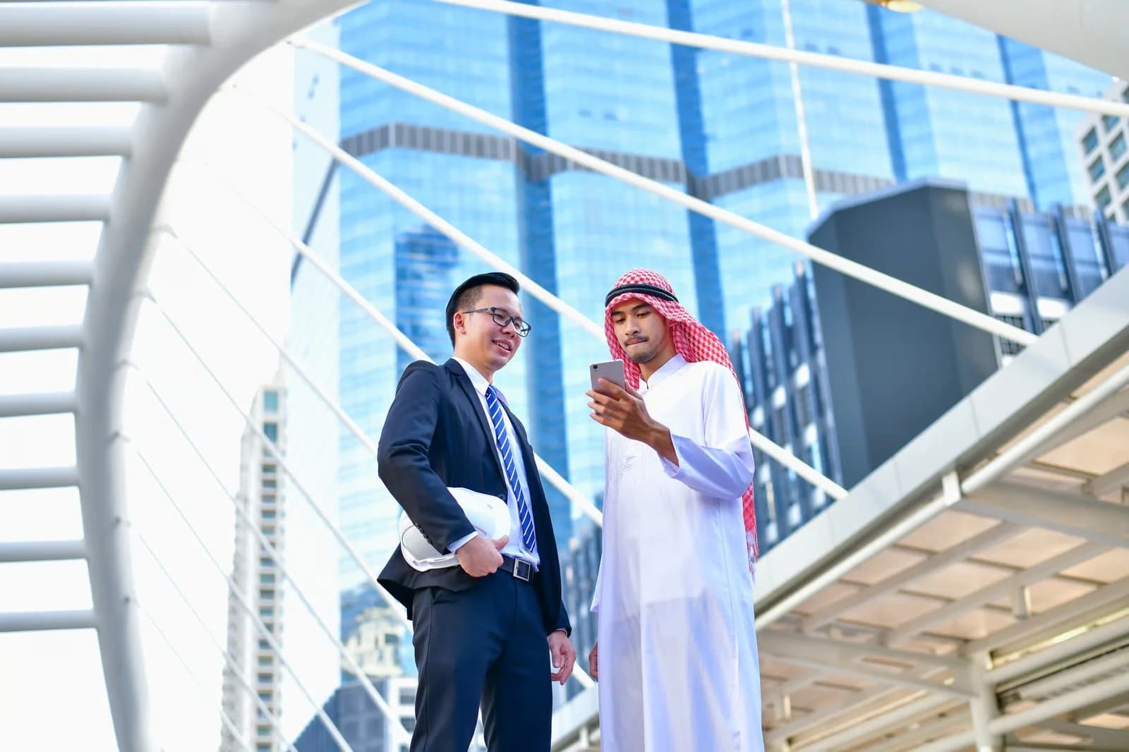 Saudi and international business professionals reviewing workforce requirements