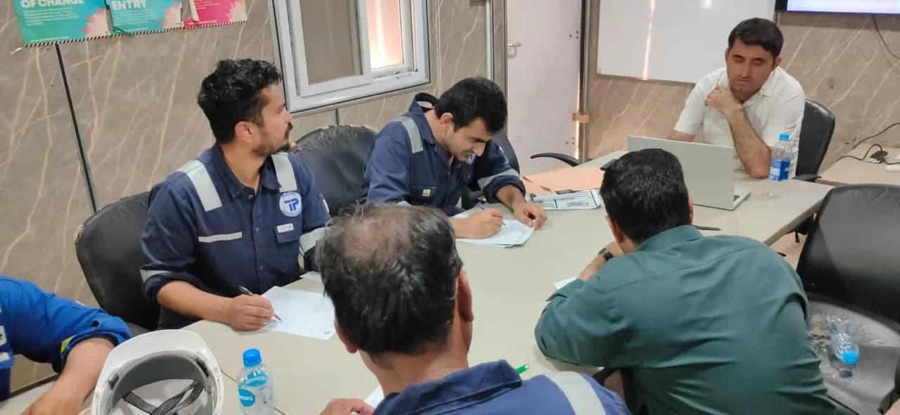 Shutdown personnel completing project planning documents