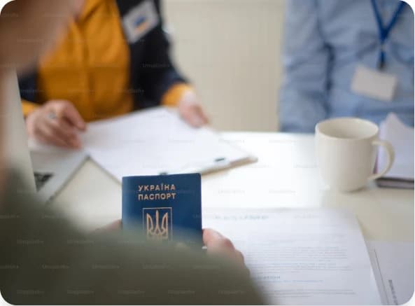 Applicant attending a visa processing appointment