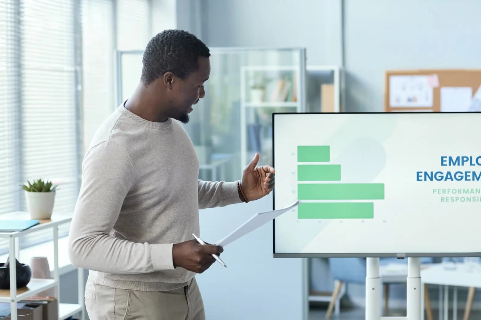 Business professional presenting an employee engagement process