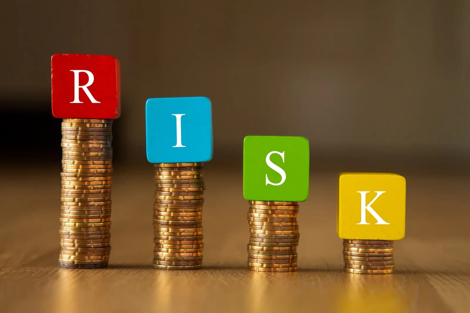 Financial risk represented by descending stacks of coins